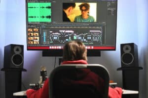 A media learner using a post production video editing suite.