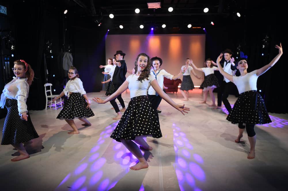 Performing arts learners taking part in a show