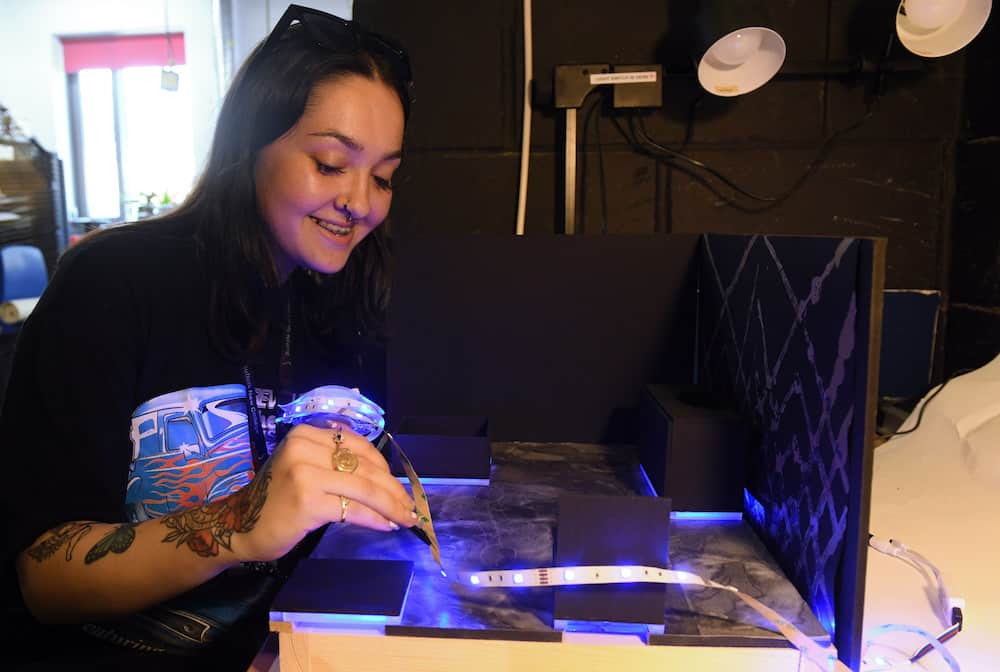 Art learner working on sculpture piece