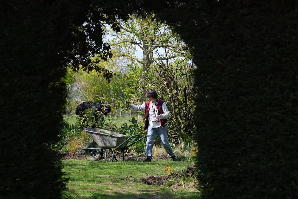 A horticulture learner working outside