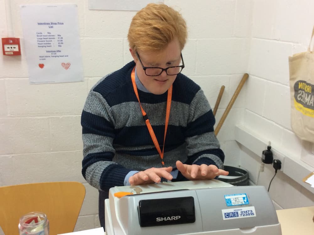 Inclusive Learner working in a shop