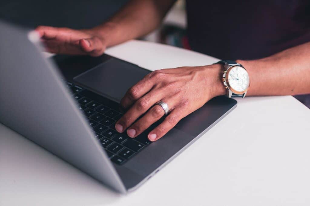 A parent using a laptop