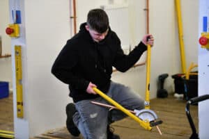 Plumbing learner using a pipe bender