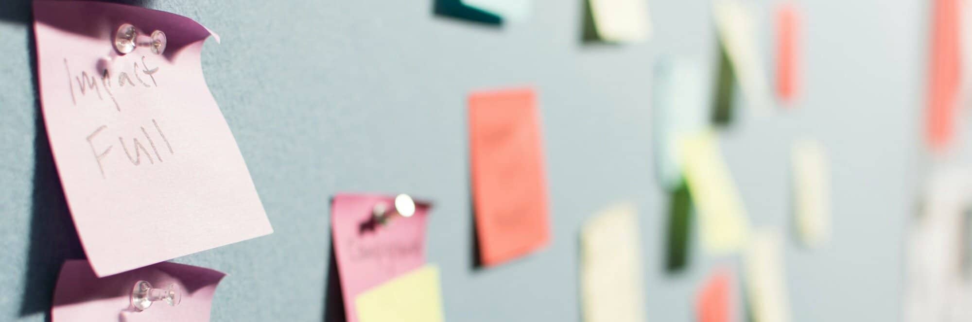 Post it notes on a wall