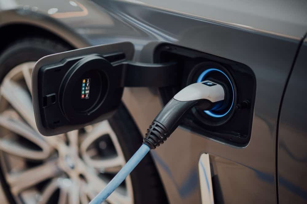 Close up photo of an electric vehicle being charged