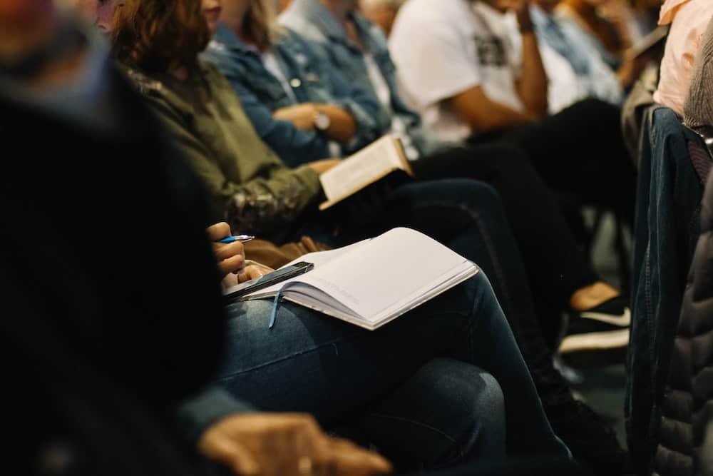 An image of adults in a training session.