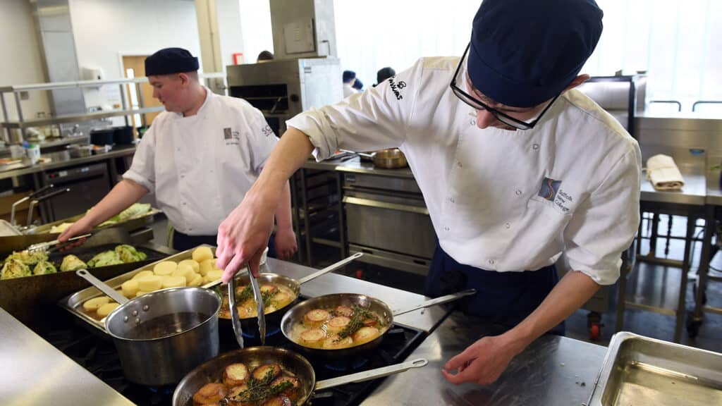 Catering & Hospitality Learners working in a training kitchen.