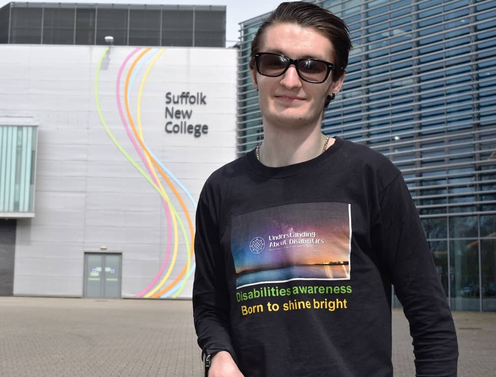 Jake Lazell with his T Shirt design outside Suffolk New College