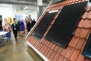 Visitors Looking At Renewable Energy Materials At The Net Zero Skills Centre