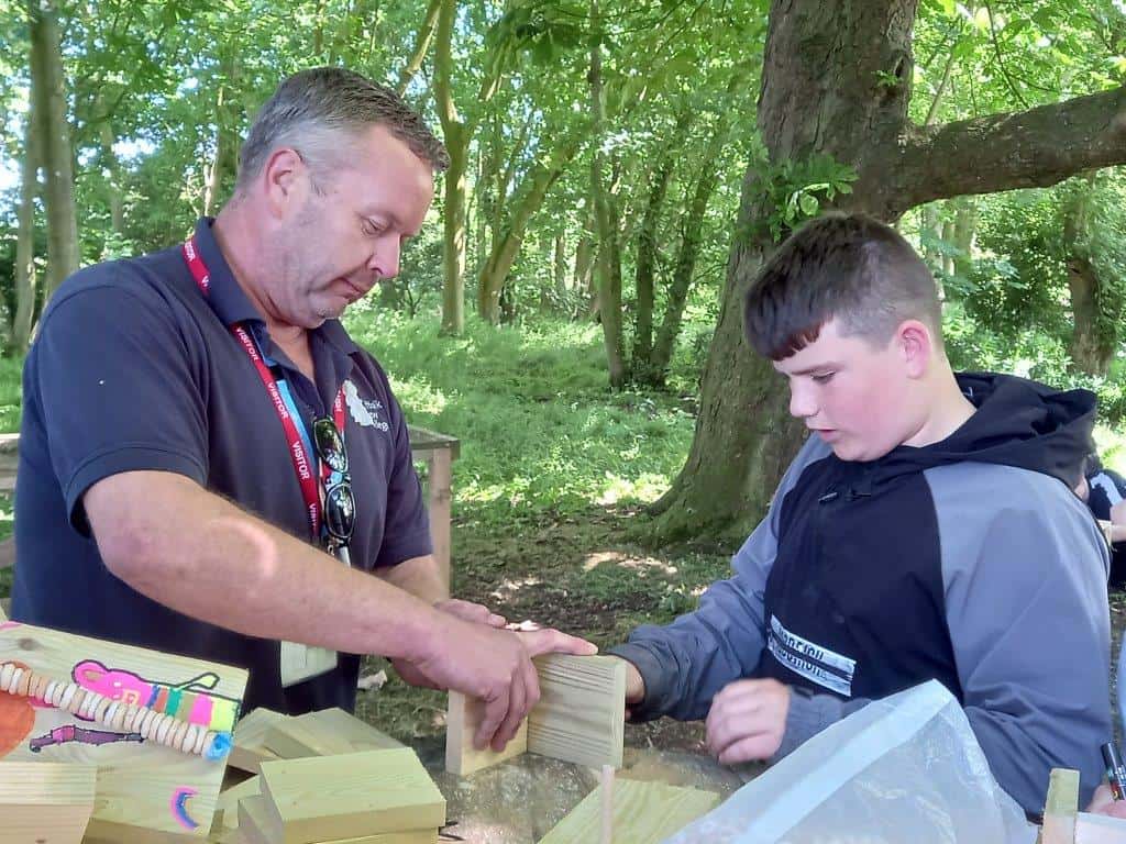 Ben Cook working with a student from wetheringsett manor school