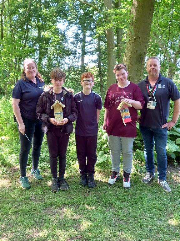 Students from wetheringsett manor school with tutors from the school and Suffolk Rural