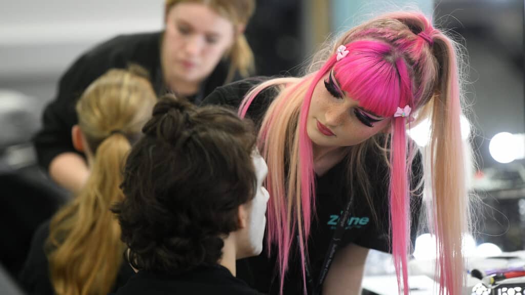 A Make Up Artistry Learner applying theatrical make up