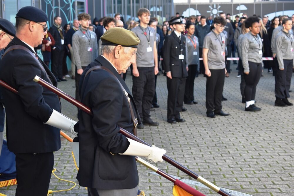 Veterans and Students stand in silence during Suffolk New Colleges Remembrance Parade