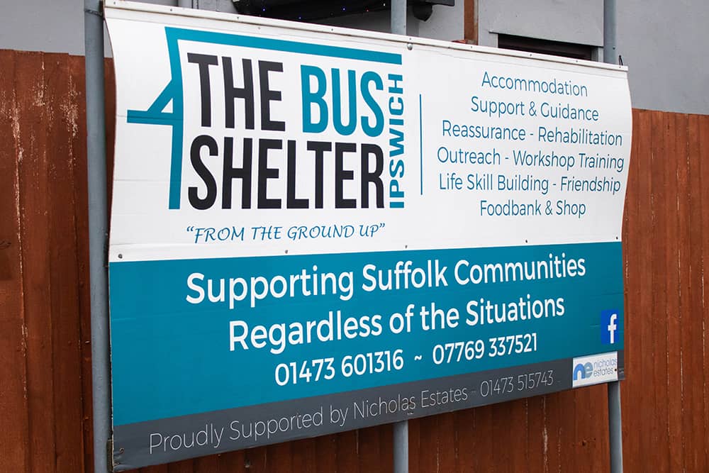 The bus shelter sign