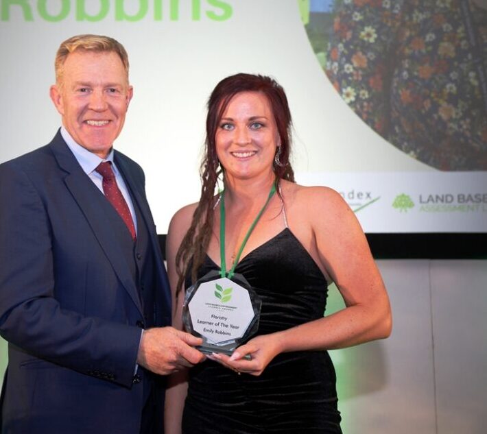 Alam henson with Emily Robbins winning her floristry award