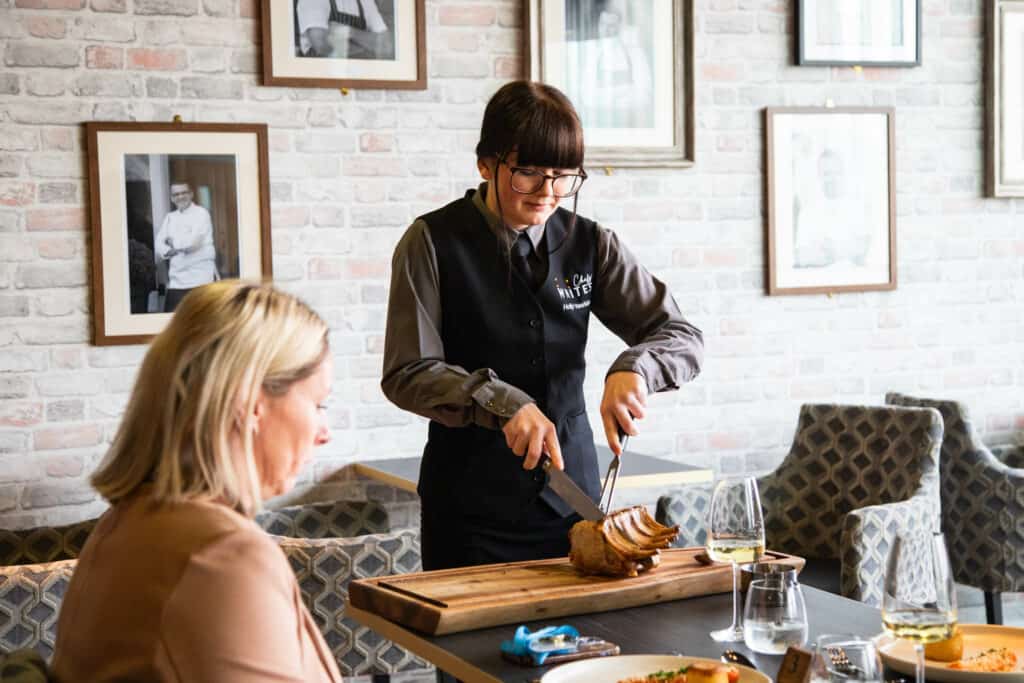 Front of house staff serving food