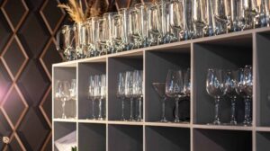 Glass rack in chefs whites resaurant