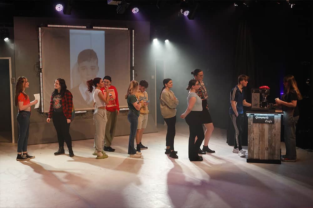 Learners performing during their production of Your Name is Dead