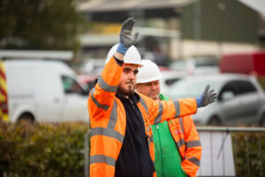 learner performing traffic marshalling
