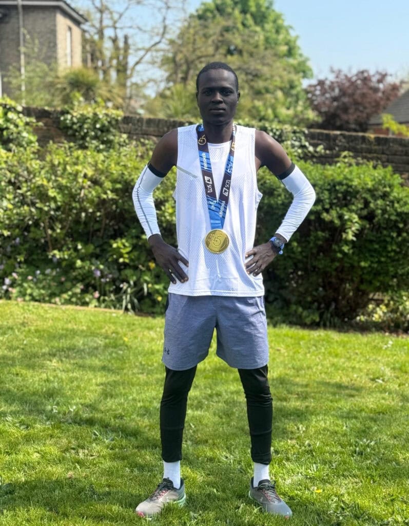 Posing with marathon medal