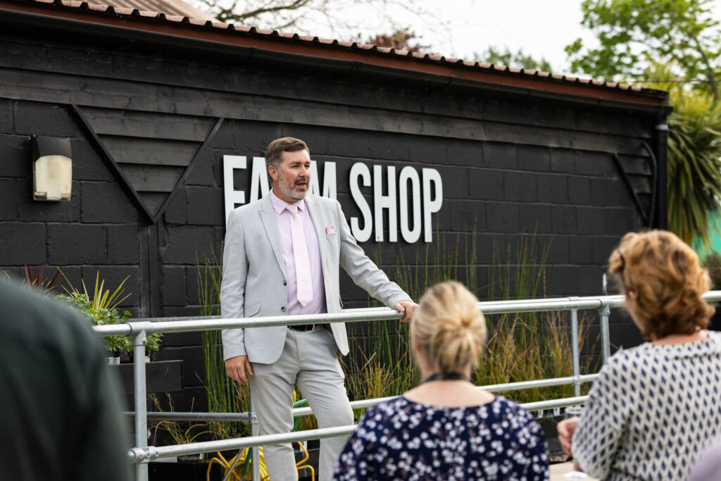 College CEO at farm shop