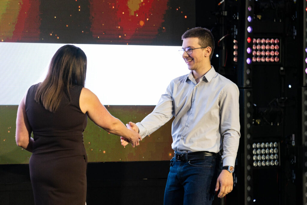 Learner receiving award at ceremony