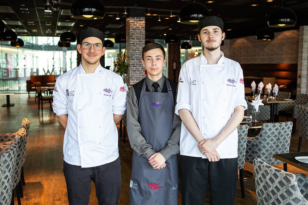 student chefs in restaurant