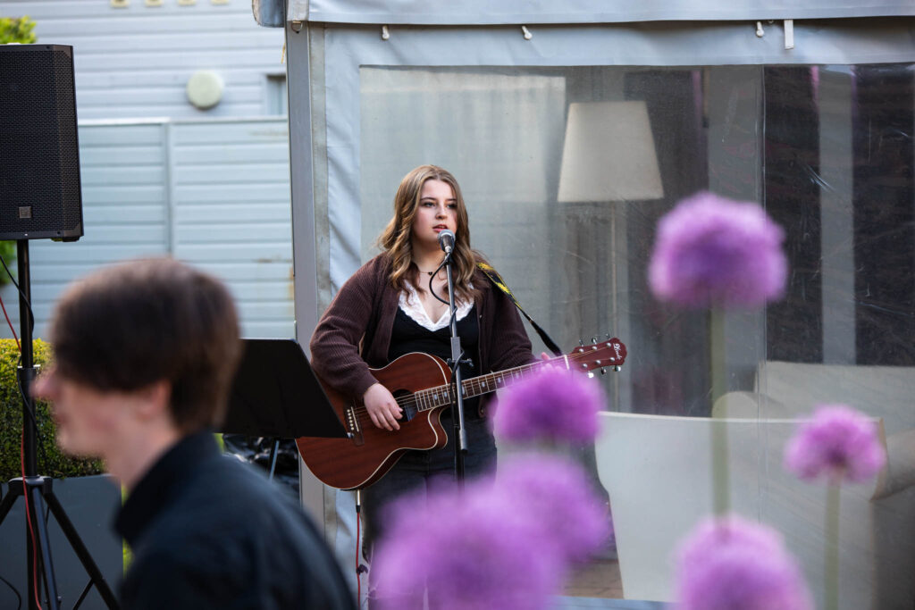 student performer at college event