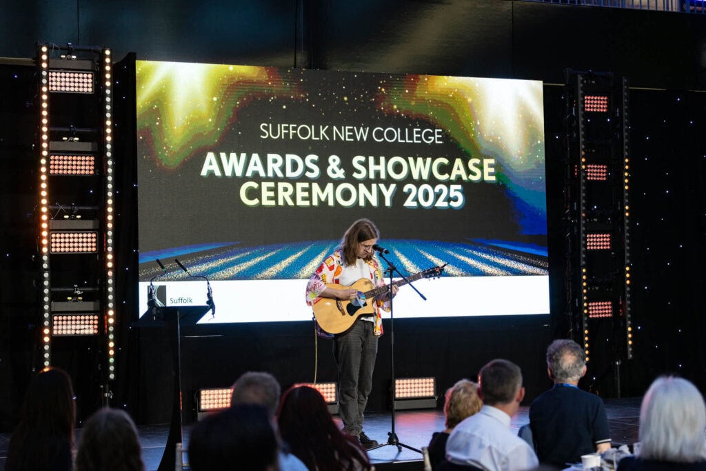 Performer on stage at awards ceremony