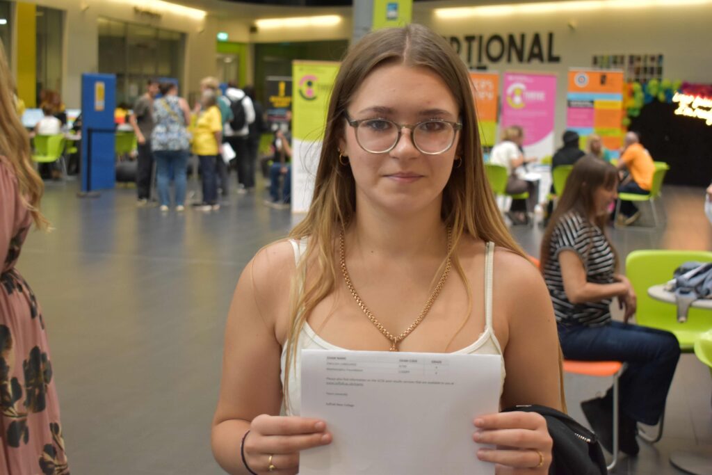 Girl with GCSE results