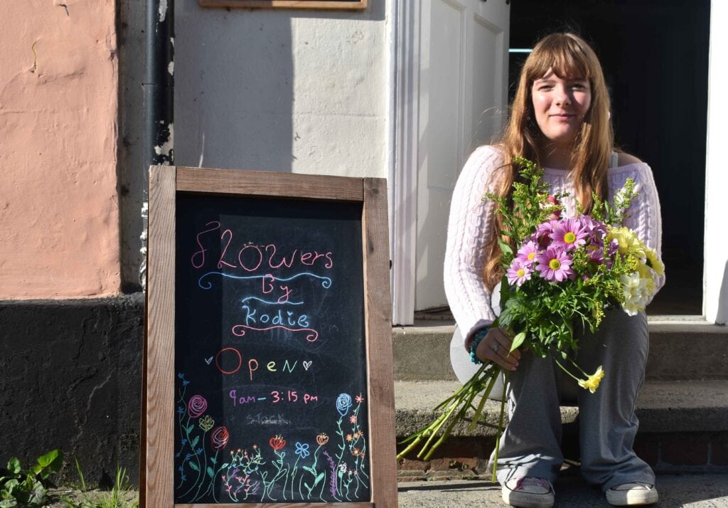 Colourful floral arrangement outside shop