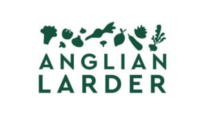 Vegetable garden with diverse herbs and plants at Suffolk New College outdoor learning space in Suffolk, UK.