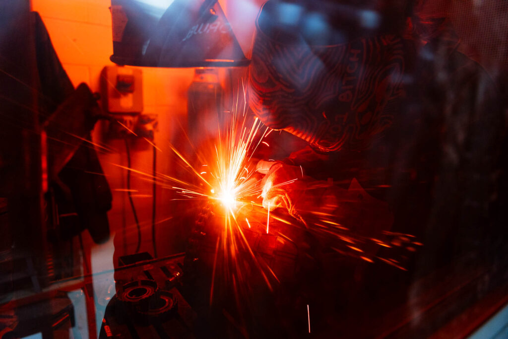 Bright sparks from welding process at Suffolk New College, offering vocational training and apprenticeships in manufacturing, engineering and trades.