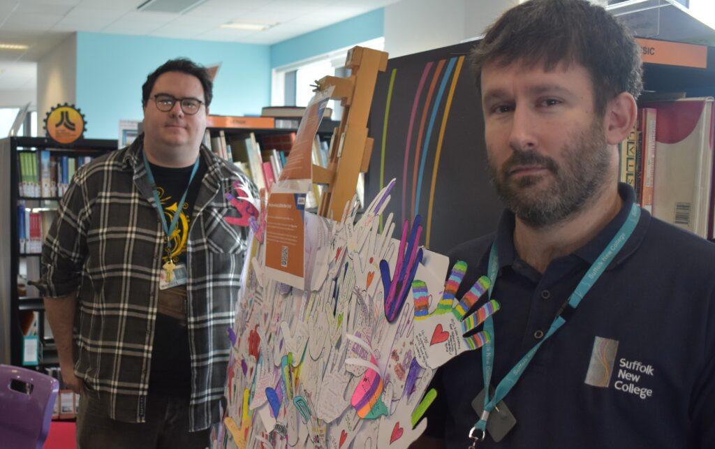 Creative learning environment at Suffolk New College showcasing student artwork and active staff participation.