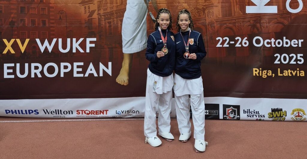 Competitive taekwondo athletes showcasing medals at the XV WUKF European event in Riga, Latvia, October 2025.