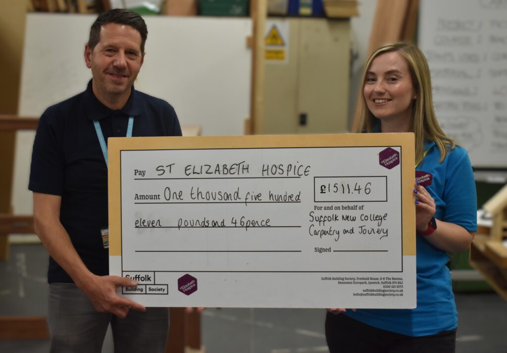 Suffolk New College staff presenting a charitable donation cheque for hospice support.