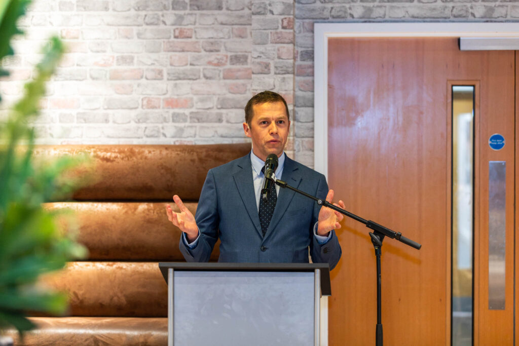 Civil engineer Gemma receiving the Suffolk New College Apprentice of the Year award at an event, highlighting her achievement after meeting the Prime Minister last year.