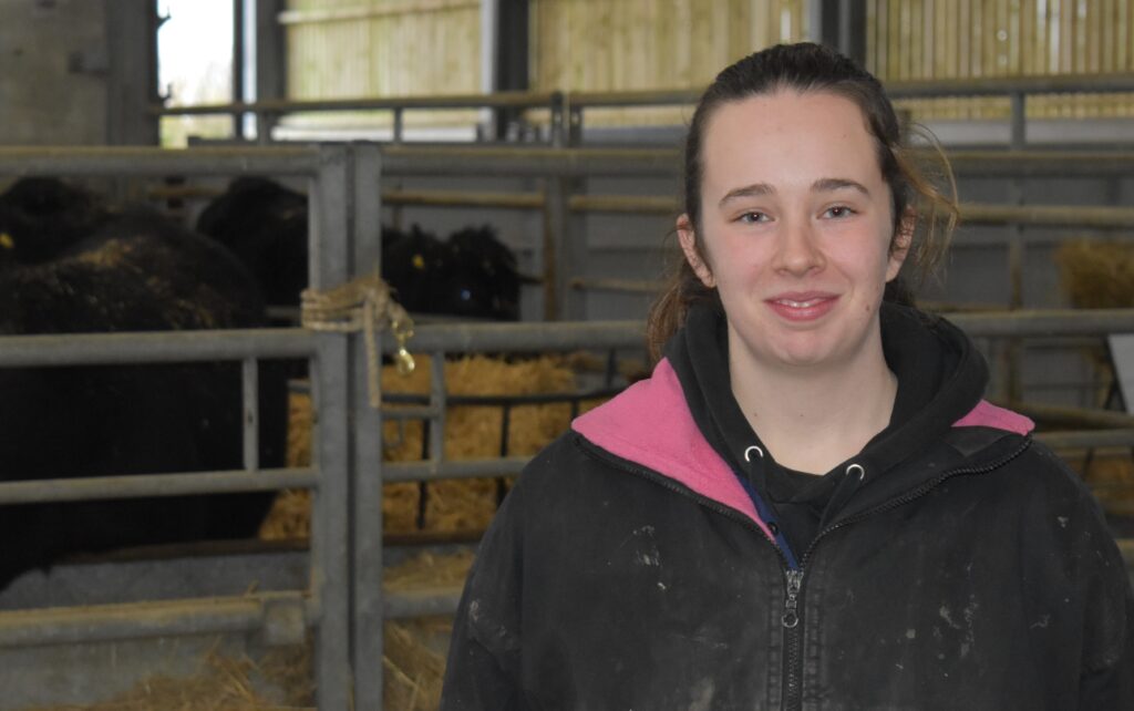 Young female student at Suffolk New College involved in farming, highlighting increased female participation in agricultural courses and rural education.