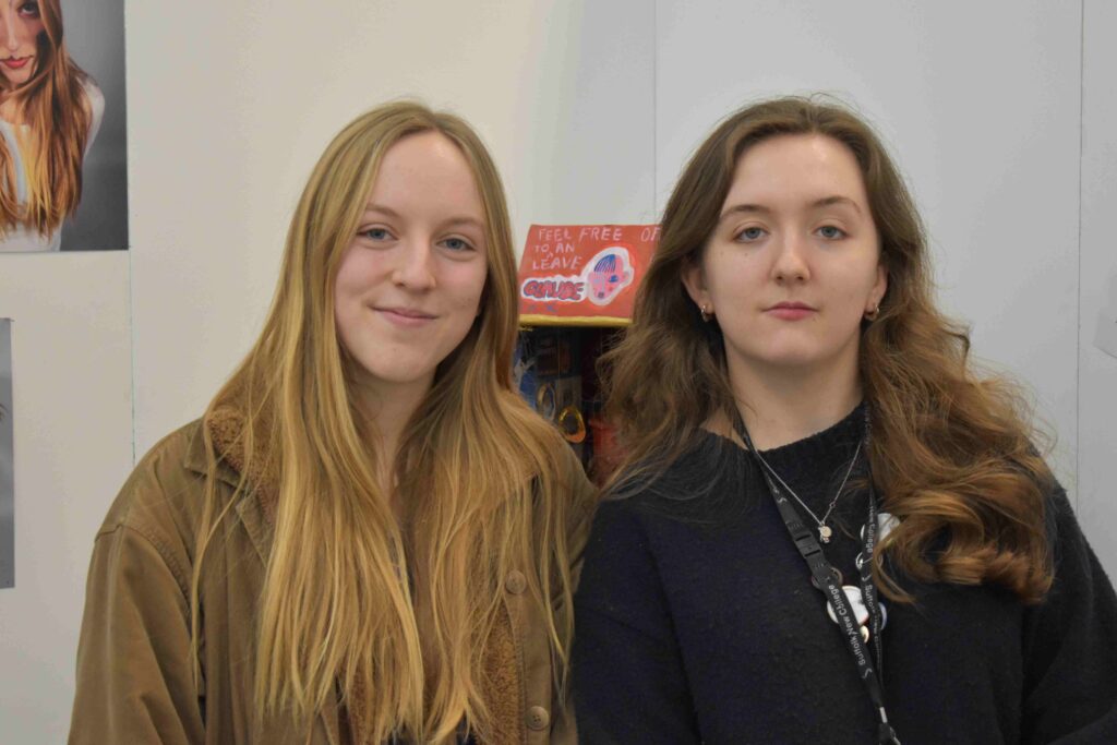 Two female students at Suffolk New College, engaging with arts and creative activities, highlighting the college's focus on arts education before university.