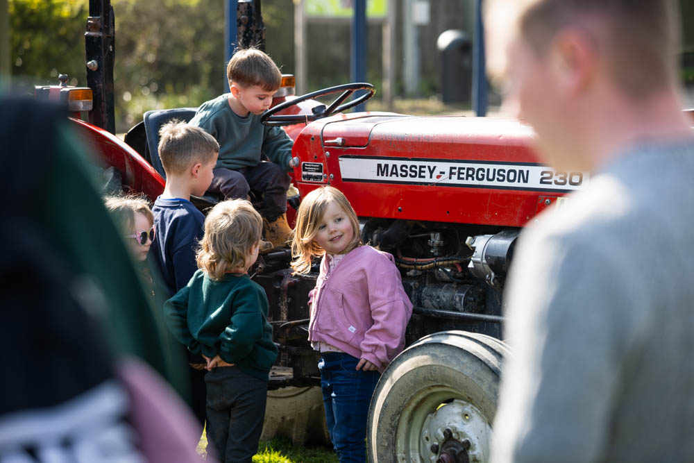 Children enjoying tractor ride at Suffolk New College spring family fun day.