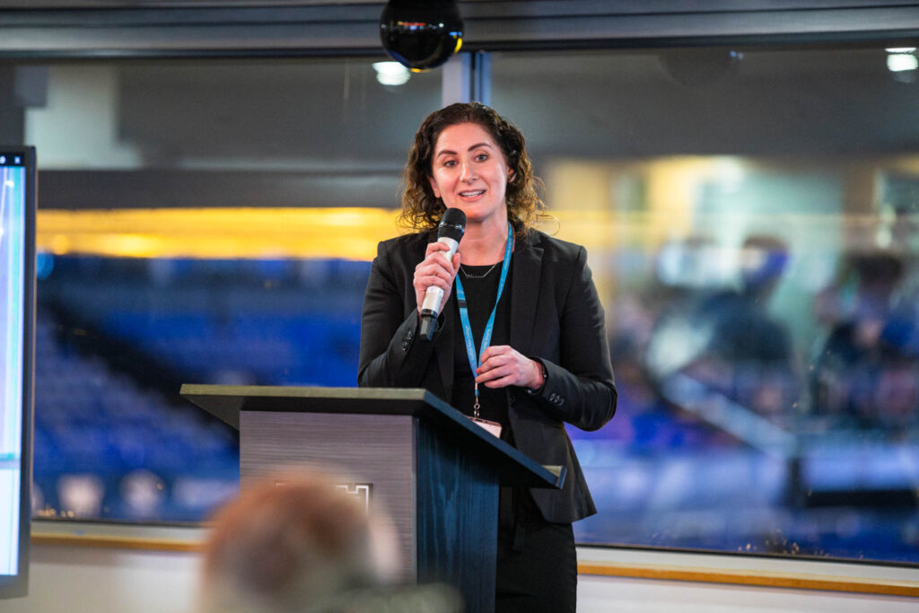 A college student from Suffolk New College delivering a speech at Ipswich Town Football Club during a student-led industry dinner for over 130 guests.
