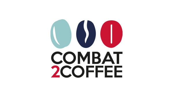Students participating in the Combat2Coffee program at Suffolk New College, engaging in coffee brewing and barista skills training as part of vocational education.