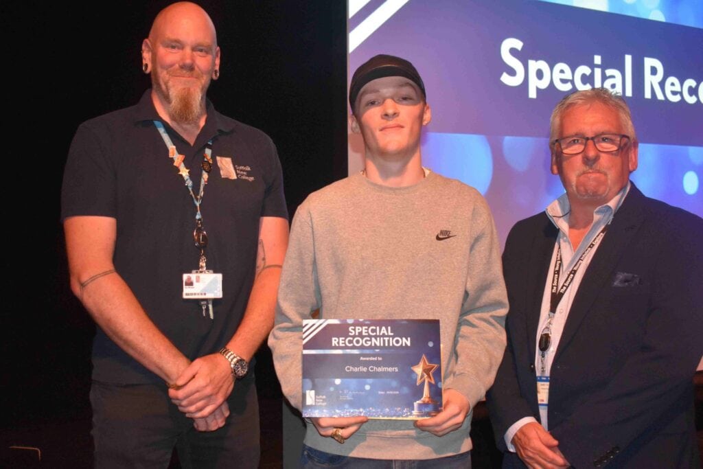 Charlie Chalmers - a rapper from Leiston received an award for his efforts at Suffolk New College on the Coast - he is pictured with Jay from SNC (left) and Gary Yates from Suffolk County Council